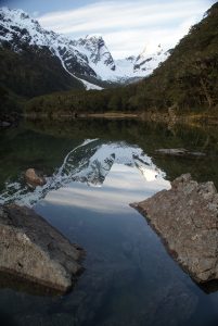 Perfect reflection at the routeburn DOC hut