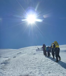 Climb up steep ice slope