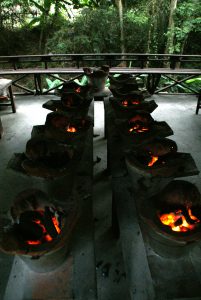 Coals for roasting, cooking and even for softening leaves Laos