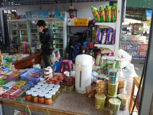 Asia bag storage: chuck the bags at the back of an open jumble sale/shop.