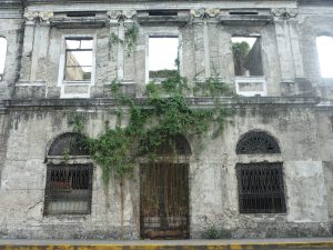 Façade of a ruined building...one of many in the city.